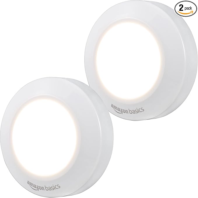 Amazon Basics LED Puck Lights, Battery Operated, 50 Lumens, Under Cabinet Lighting, Easy to Install, Easy to Use, Adhesive Backing, 2-Pack, White