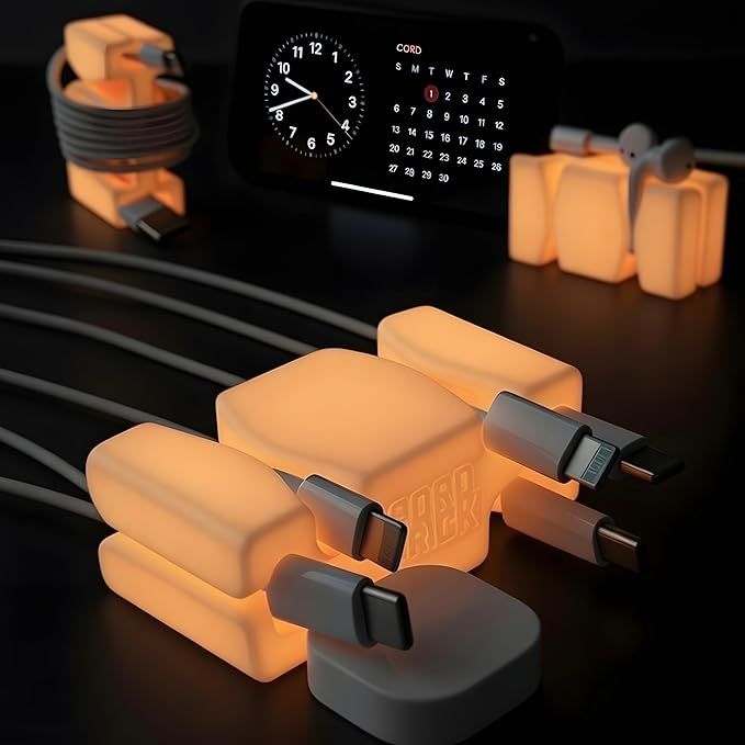 CordBrick Glowing Silicone + Steel Weighted Cable Holder for Nighstand, Cord Wrap for Travel, Unique iPhone Accessory. Small Graduation Gift for High Schoolers. Gadget for Teens. Orange Glow